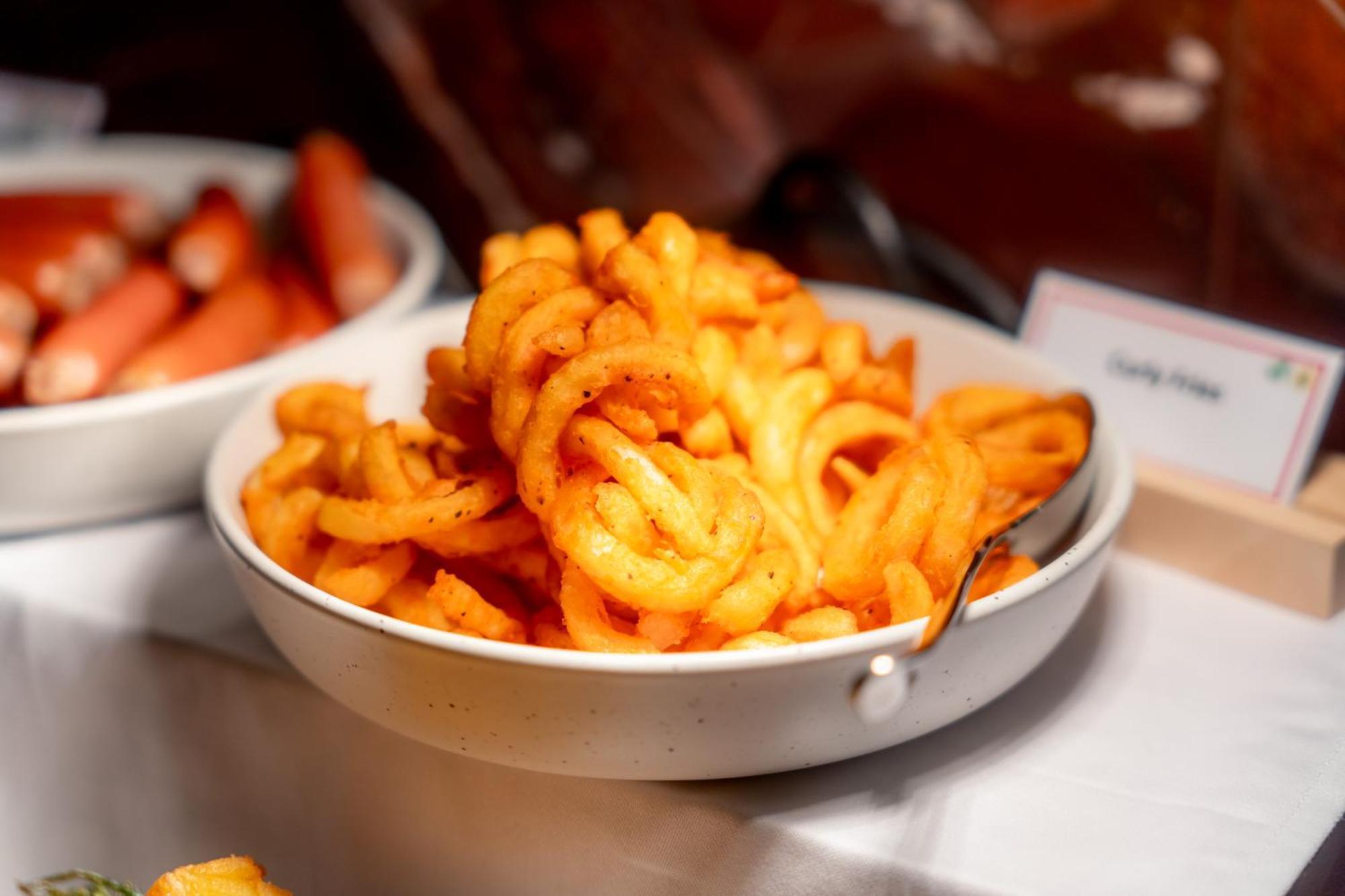 Ascott Embassy Sathorn Bangkok Hotel Exterior photo A bowl of masala fries