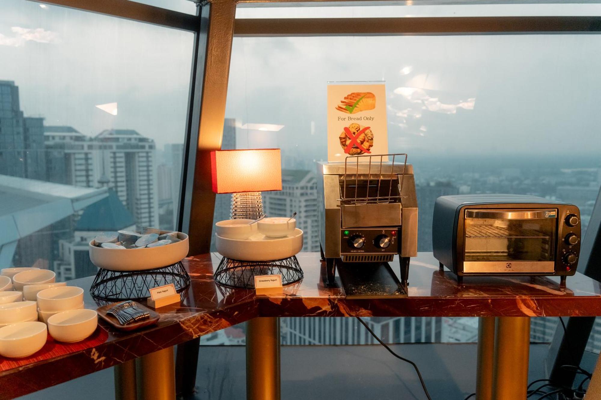 Ascott Embassy Sathorn Bangkok Hotel Exterior photo A coffee machine at a hotel
