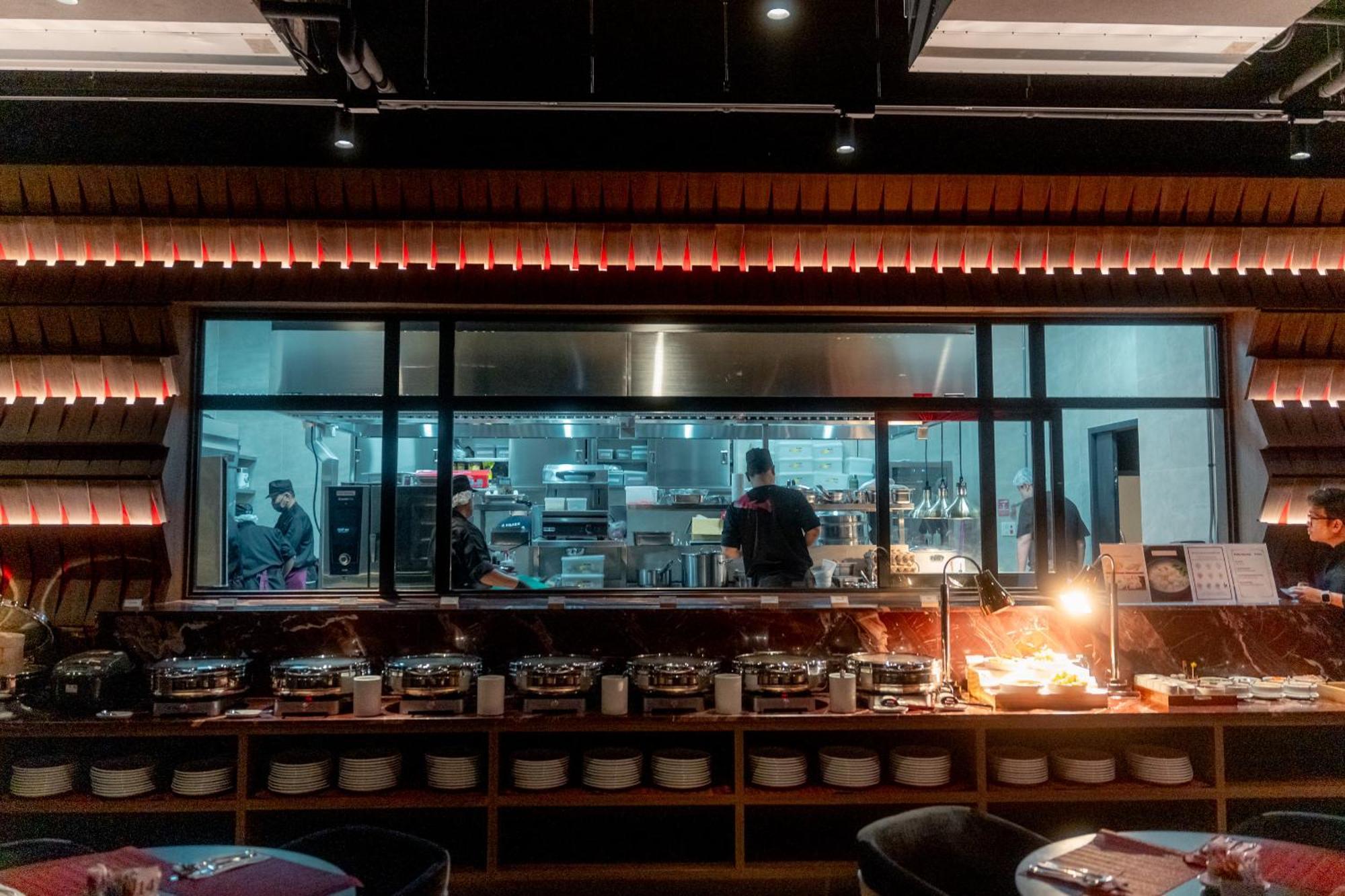 Ascott Embassy Sathorn Bangkok Hotel Exterior photo The open kitchen at the restaurant