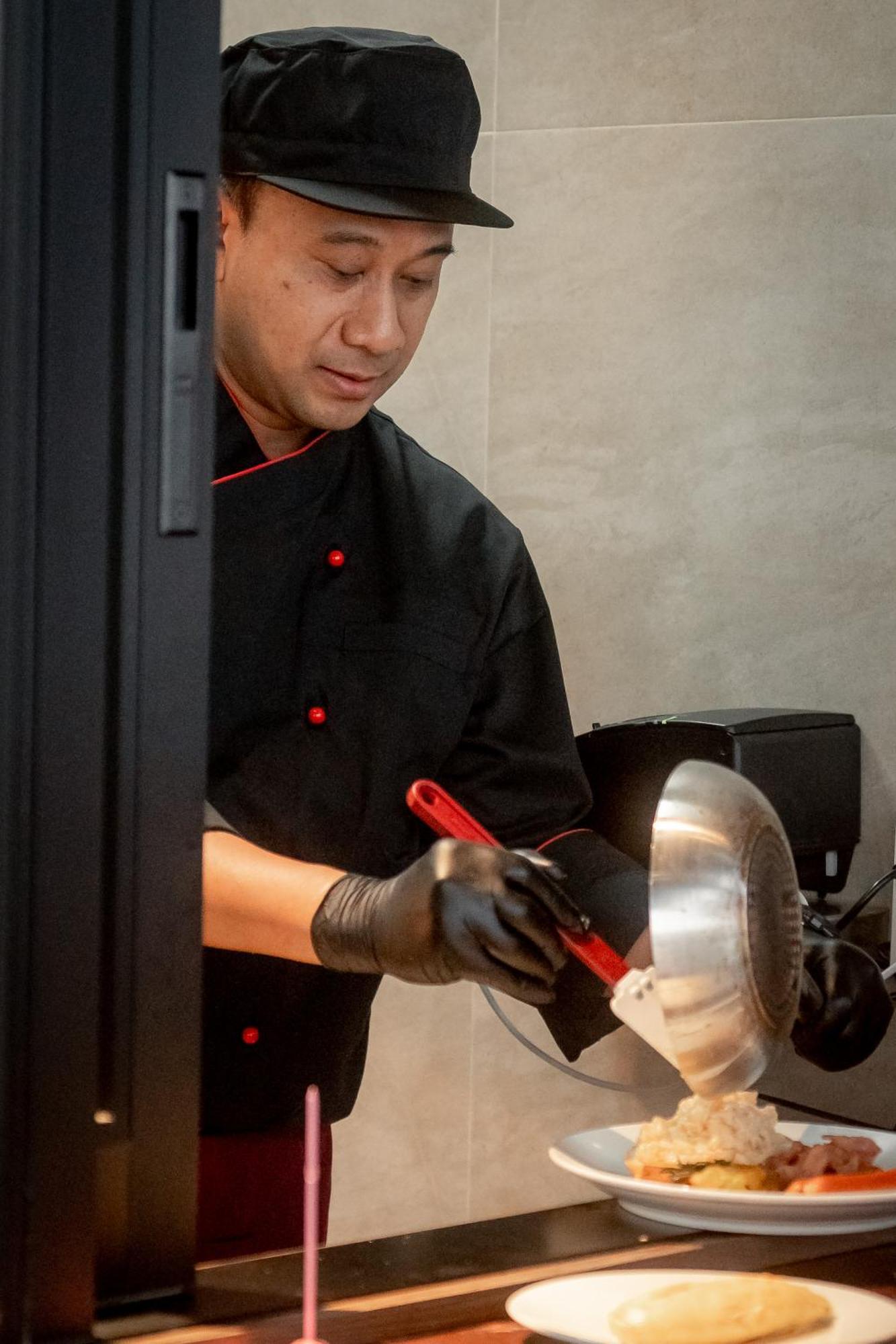 Ascott Embassy Sathorn Bangkok Hotel Exterior photo A waiter writing down an order